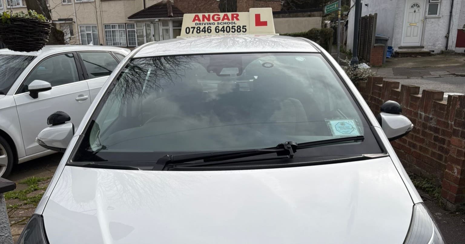 Angar Driving School Toyota Yaris with roof sign